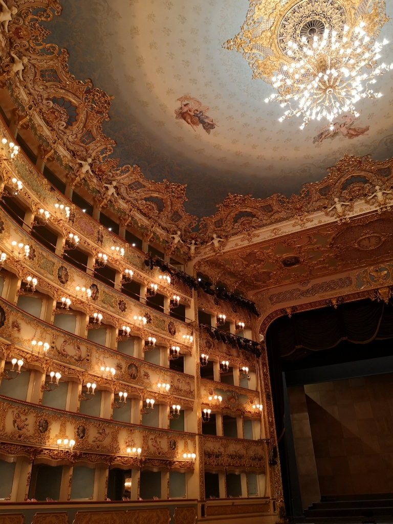 The ornate gold interior of the Teatro Al Fenice auditorium